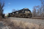 NS 8108 and 1124 lead a stack train down the siding at MP 116